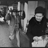 January 14th, 1974 -- George and Inex Cardinal and their family being evicted from their apartment at 1712 East Broadway. Agnes Cardinal, sister of Inex, about to attack a passing Chinese woman because the owners of the apartment the Cardinal family was being evicted from was Chinese.